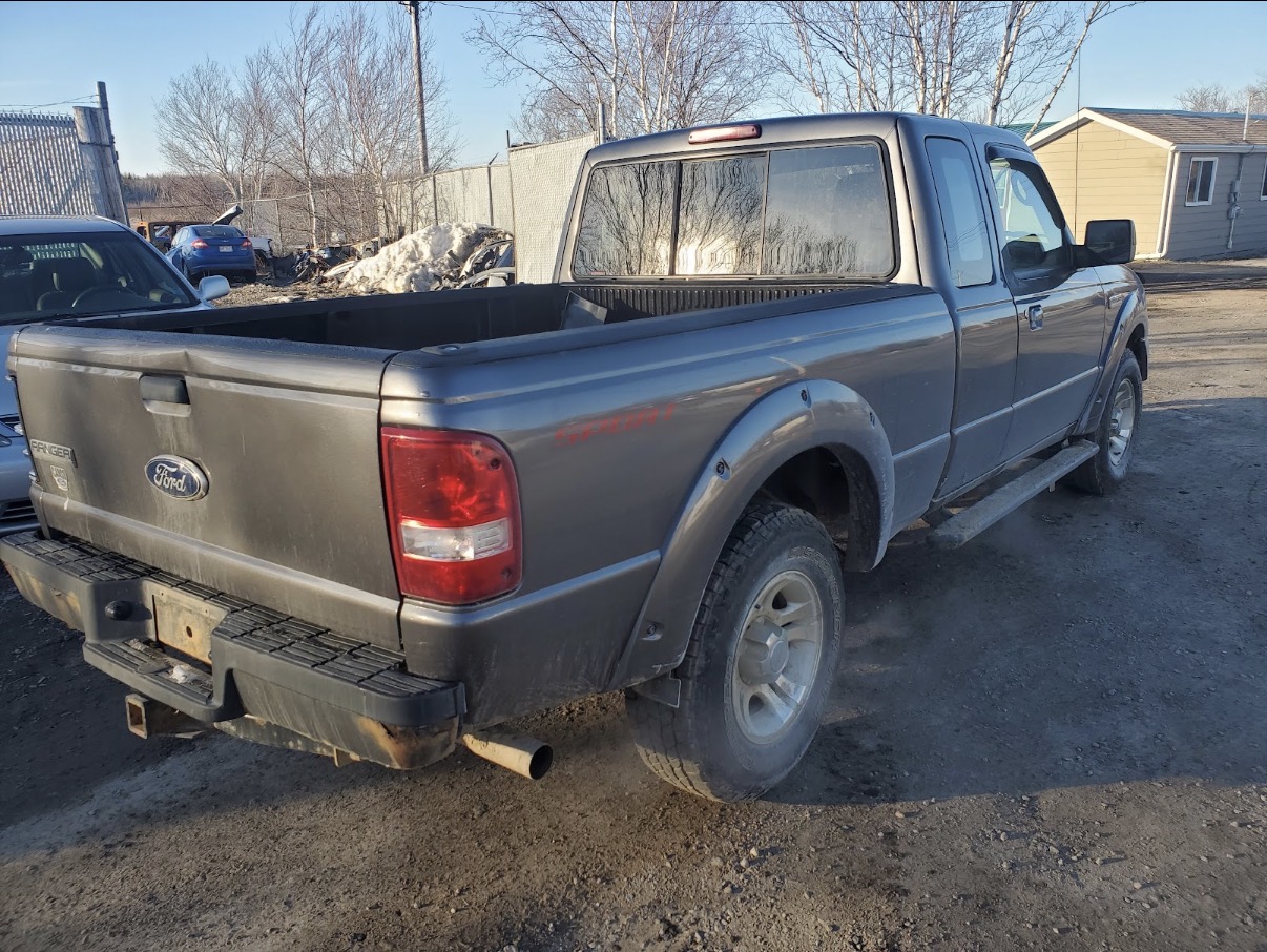 Row of used pickup trucks for sale